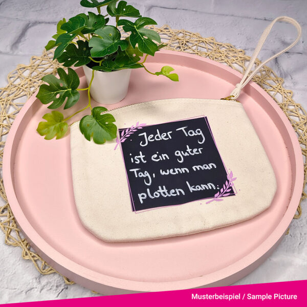 An area was plotted onto a bag using the chalkboard film. The text ‘Every day is a good day if you can plot’ is written on it with a chalk pen.